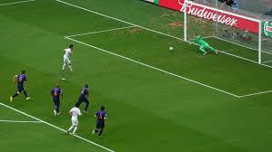 Referee endorses goal even though ball goes from side of goal