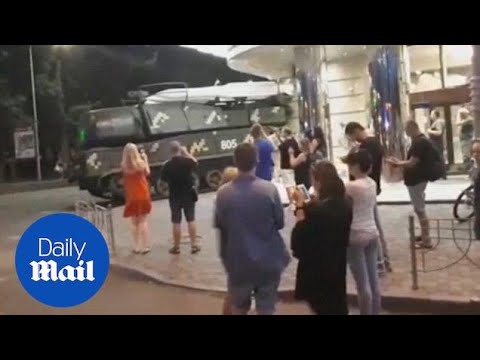 Military vehicle slams into building in Ukraine