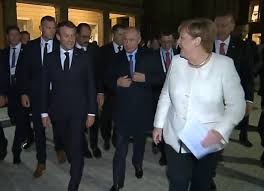 Merkel asks Putin question in Russian