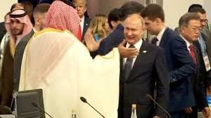 Putin and Saudi Arabia prince high-five at G20 summiy