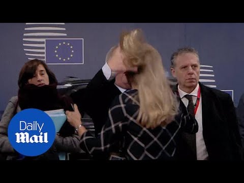 European Commission President ruffles female official’s hair during EU summit