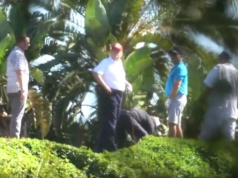 Donald Trump golfing while surrounded by Secret Service as the former president of the US