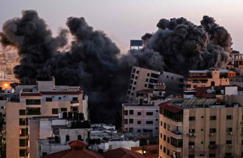 Israel destroys 13-story apartment building in Gaza Strip