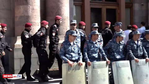 Police, armed with shields, ‘protect’ Armenia government building
