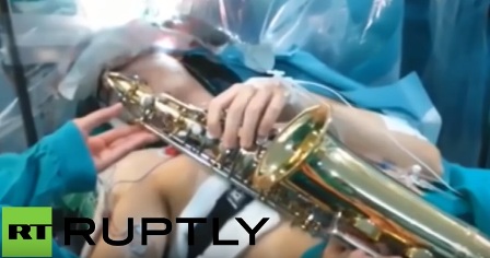 Patient playing saxophone while brain tumour surgery