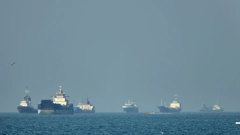 Iran and Oman are negotiating the resumption of shipping through the Strait of Hormuz