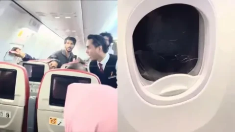 Passenger damaged emergency exit and tried to open airplane door midair during Kuala Lumpur–Kochi flight